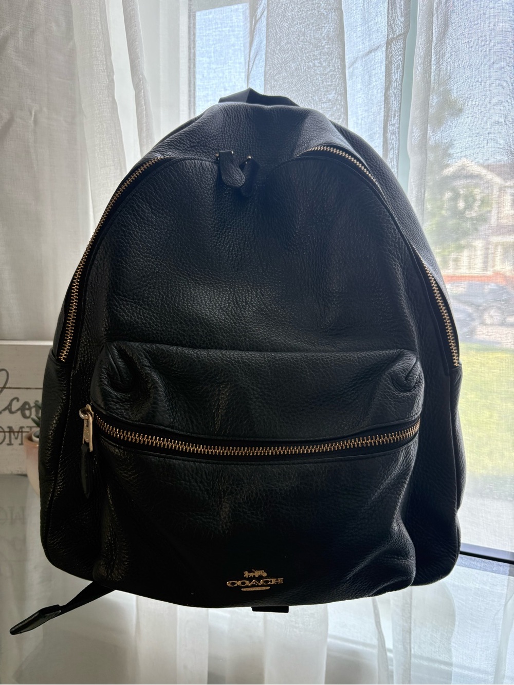 Coach Black Leather Backpack with Gold Hardware Accents